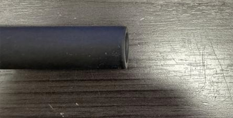 Manganese phosphate coated sample after one year in the field with no visible corrosion